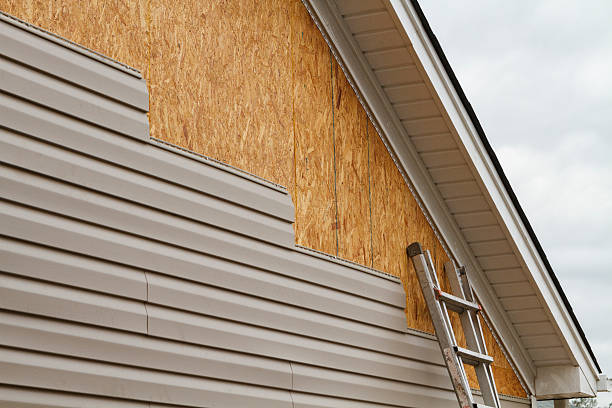 Professional Emergency Siding Repair technician working in Spencer, OH
